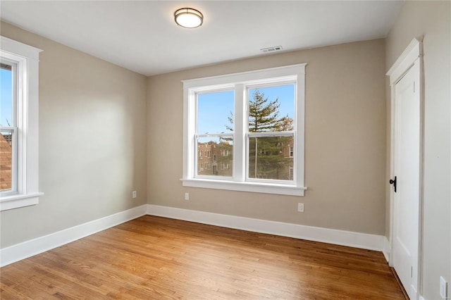 empty room featuring light hardwood / wood-style floors