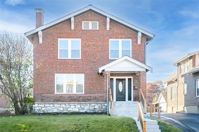 view of front of house with a front lawn