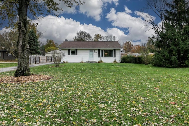 ranch-style house with a front yard