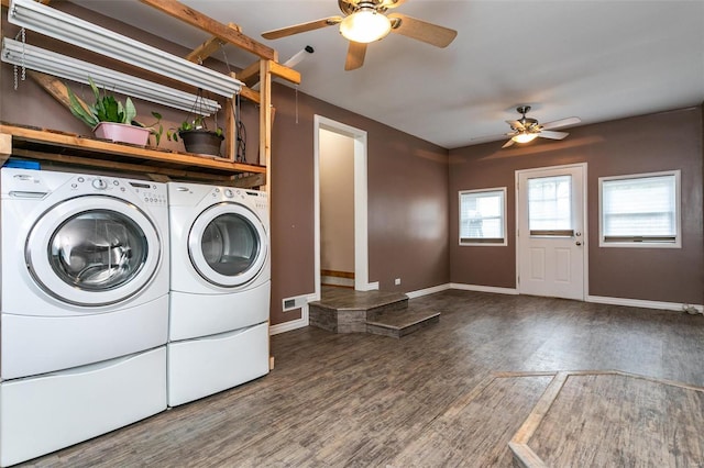 laundry area with separate washer and dryer, ceiling fan, and dark hardwood / wood-style floors