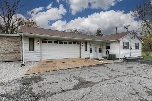 single story home featuring a garage