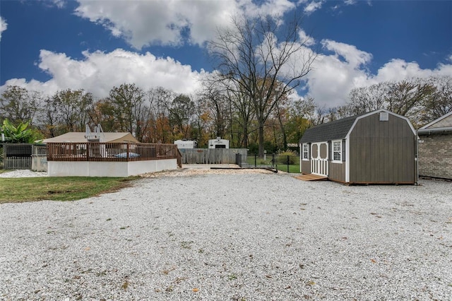 view of yard with a storage unit