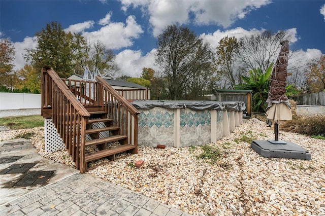 exterior space featuring a wooden deck