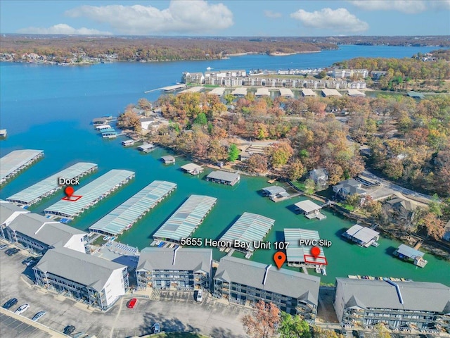 birds eye view of property featuring a water view