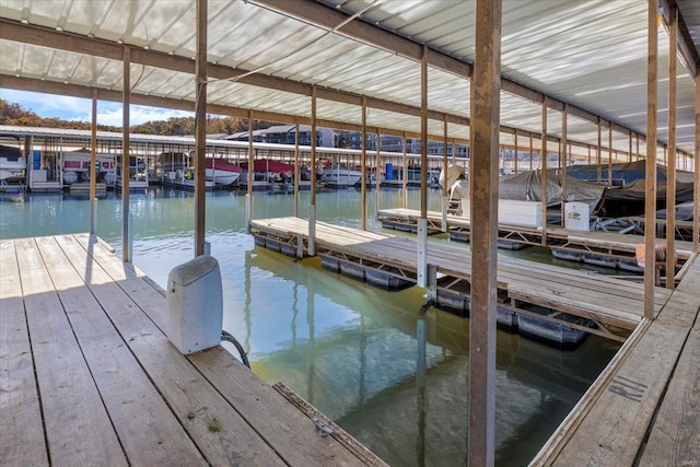 view of dock with a water view