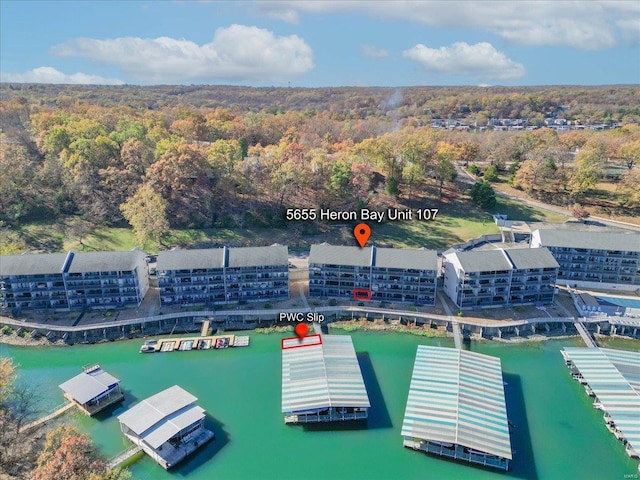 birds eye view of property featuring a water view