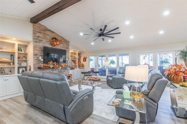 living room with vaulted ceiling with beams, ceiling fan, light hardwood / wood-style floors, and french doors