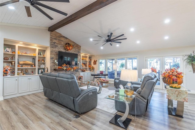 living room with beam ceiling, light hardwood / wood-style flooring, french doors, and ceiling fan