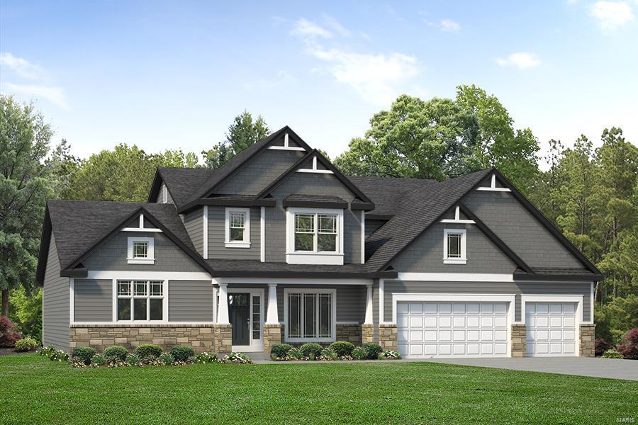 craftsman house featuring a garage and a front lawn