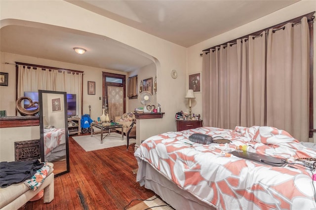 bedroom featuring dark wood-type flooring