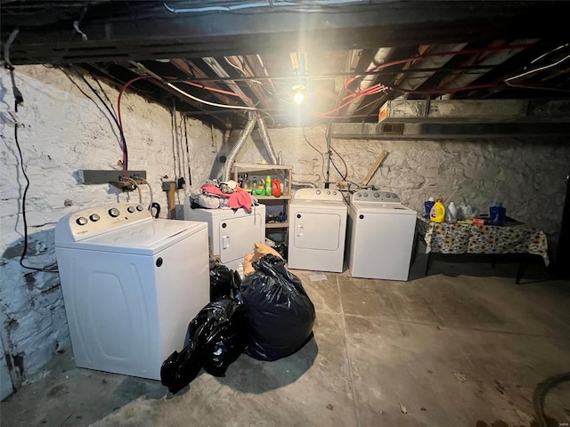 basement featuring separate washer and dryer