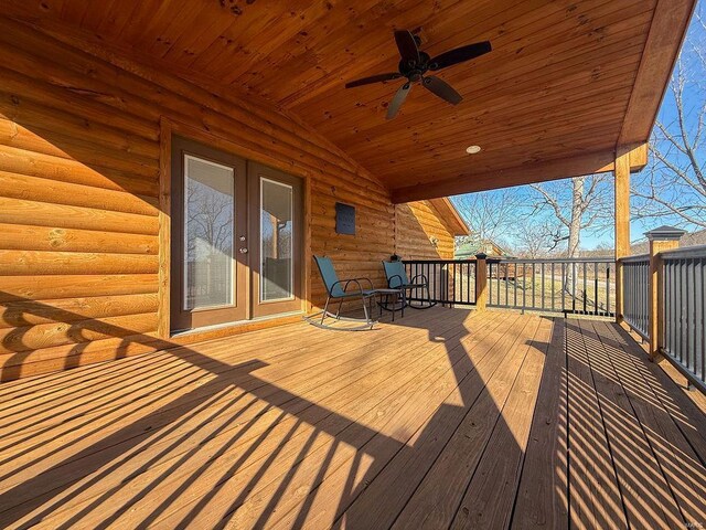 deck featuring french doors and a ceiling fan