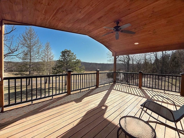 wooden deck with ceiling fan