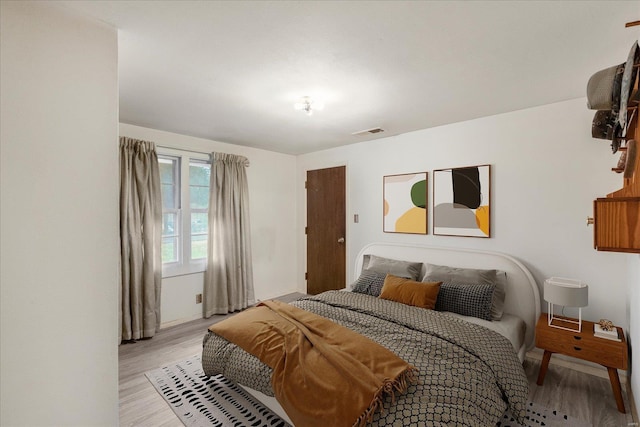 bedroom featuring light hardwood / wood-style floors