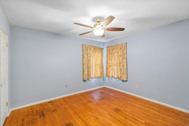 unfurnished room featuring wood-type flooring and ceiling fan