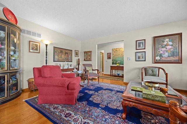 living room with hardwood / wood-style flooring