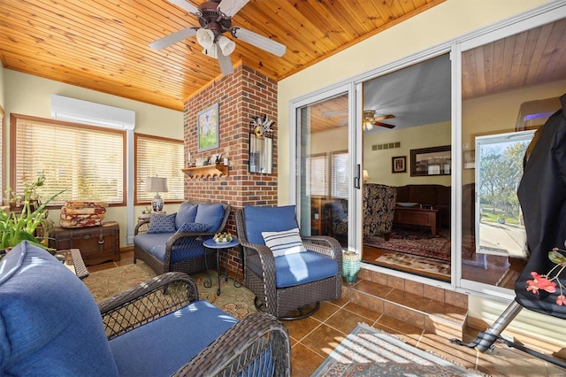 sunroom featuring a wall mounted air conditioner, a healthy amount of sunlight, and wood ceiling