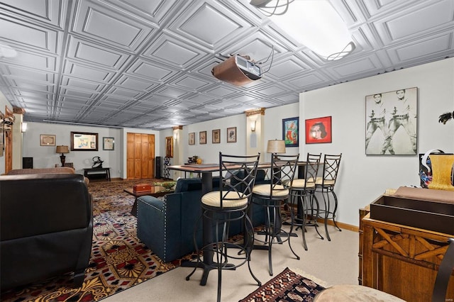 living room with light carpet and indoor bar