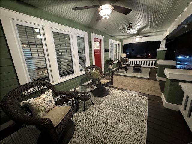 view of patio featuring ceiling fan and covered porch