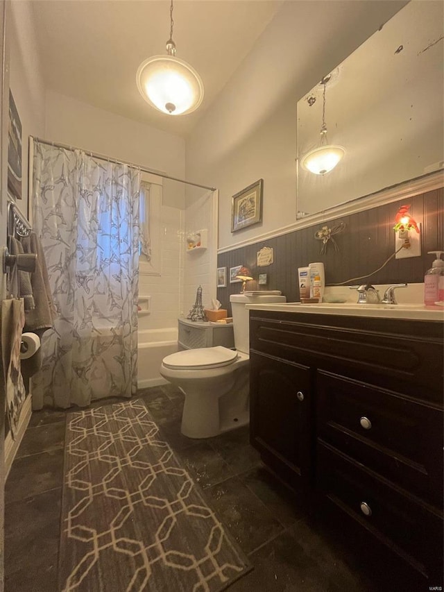 full bathroom featuring vanity, toilet, and shower / bath combo with shower curtain