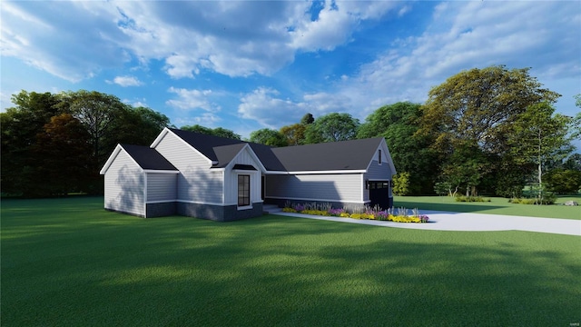 ranch-style house with a garage and a front lawn