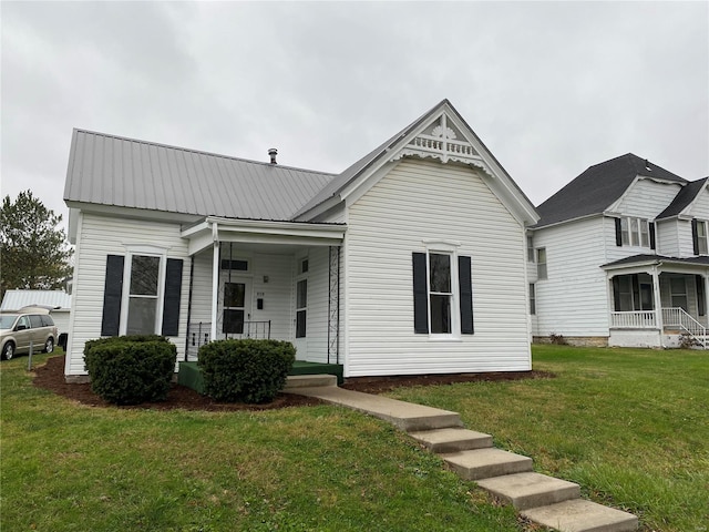 view of front of home featuring a porch and a front yard