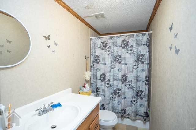 bathroom with vanity, crown molding, toilet, a textured ceiling, and curtained shower