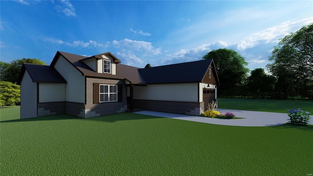 view of front of home featuring a garage and a front lawn