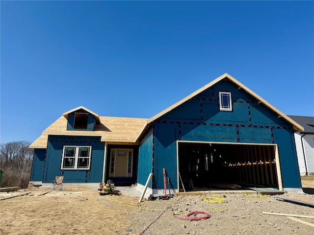 property under construction with an attached garage