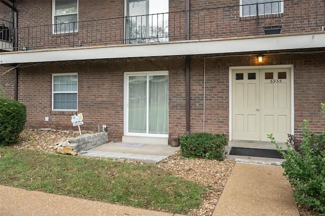 doorway to property with a balcony