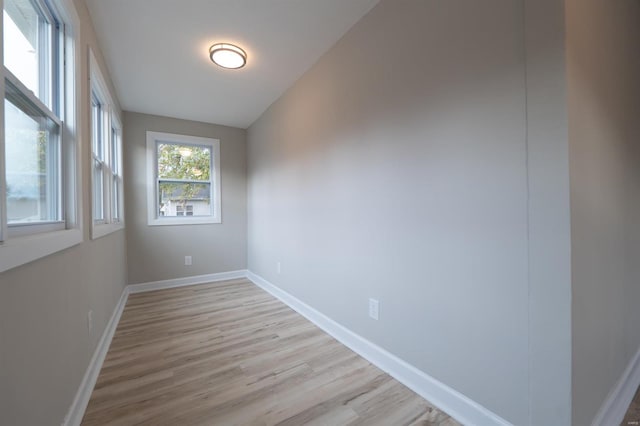 spare room with light wood-type flooring