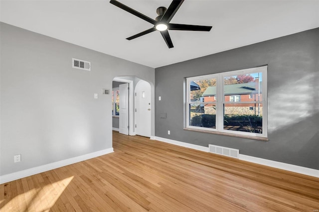 unfurnished room featuring ceiling fan and light wood-type flooring