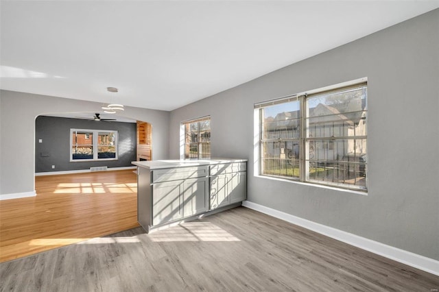 spare room with hardwood / wood-style flooring and ceiling fan