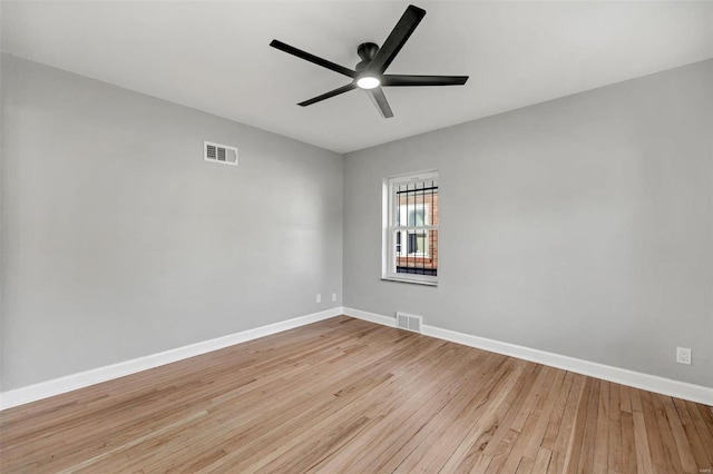 unfurnished room featuring ceiling fan and light hardwood / wood-style flooring