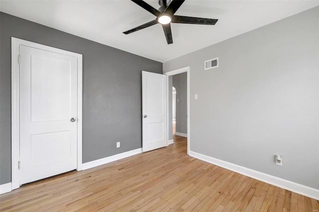 unfurnished bedroom featuring ceiling fan and light hardwood / wood-style flooring