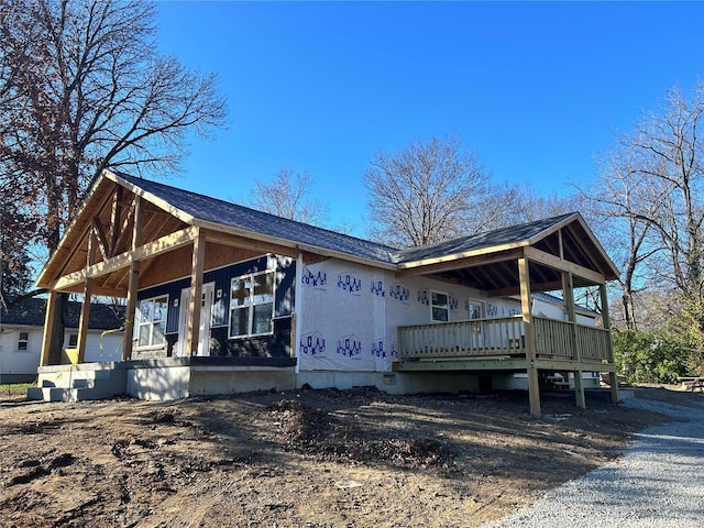 view of property exterior with covered porch