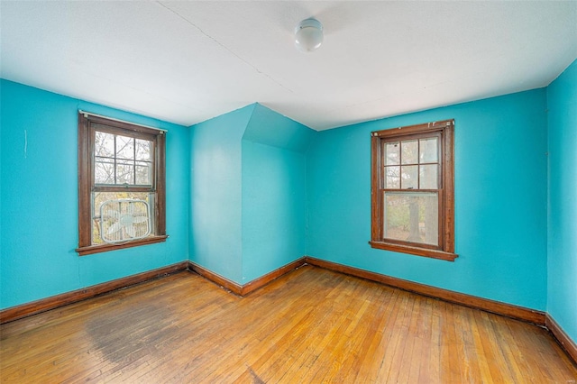 spare room featuring light hardwood / wood-style flooring