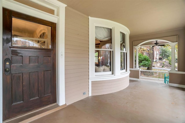 doorway to property featuring covered porch