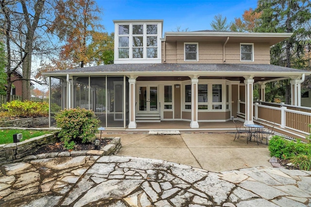 rear view of house with a porch