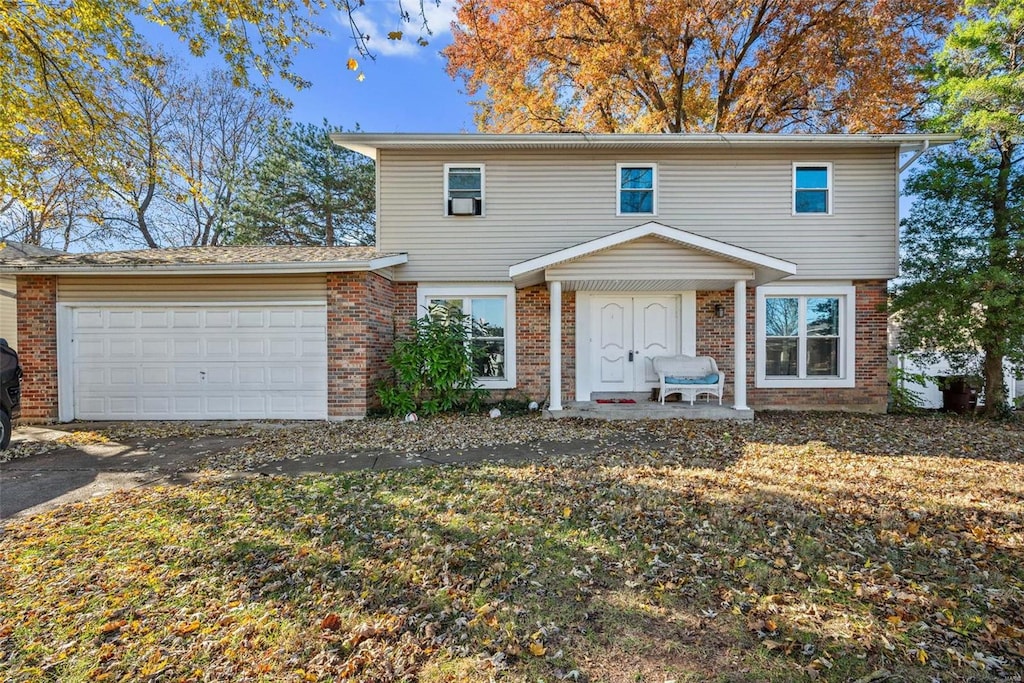 front facade with a garage