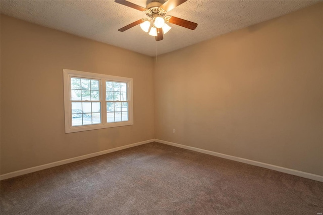 unfurnished room featuring ceiling fan, carpet floors, and a textured ceiling