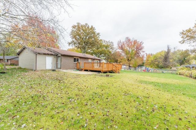 view of yard featuring a deck