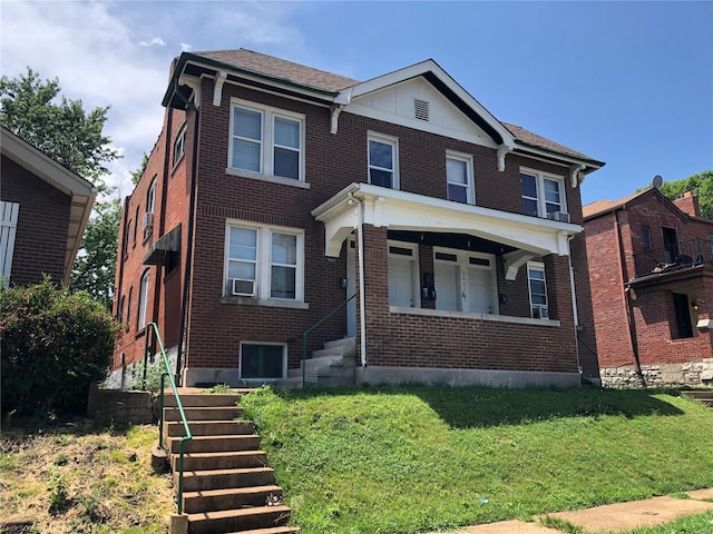 view of front of property with a front yard