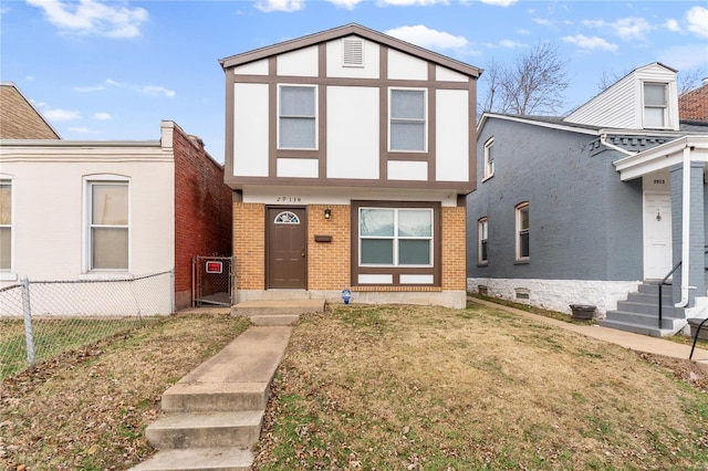 view of front of home featuring a front lawn