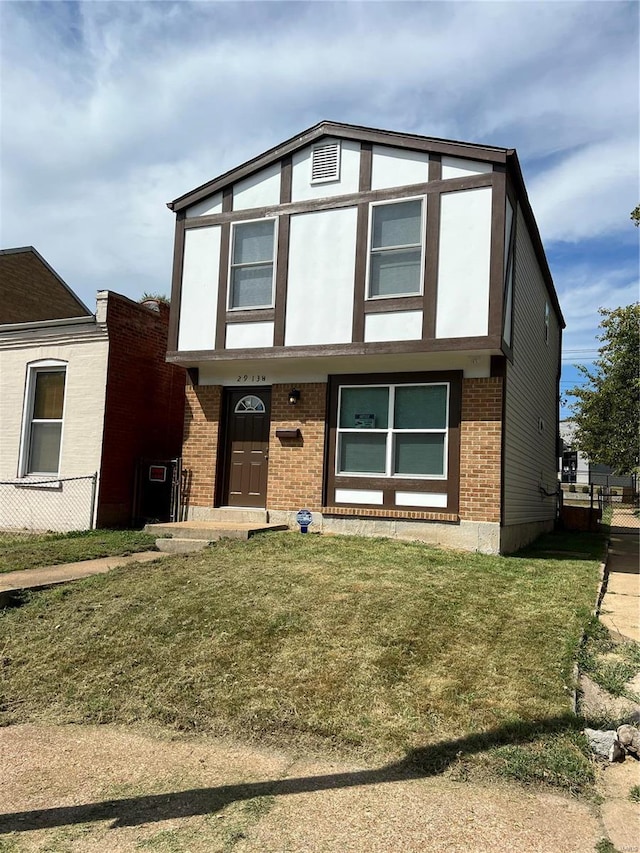 view of front facade with a front lawn