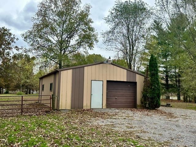 view of outbuilding featuring a garage