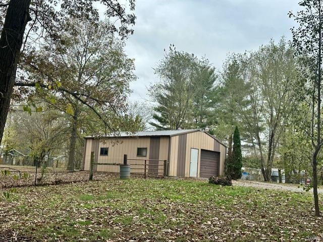 view of outbuilding featuring a garage