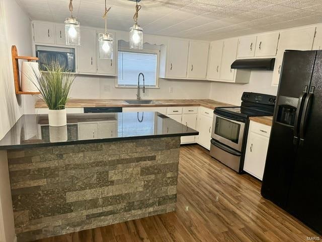 kitchen with dark hardwood / wood-style flooring, black refrigerator with ice dispenser, stainless steel electric stove, sink, and white cabinets