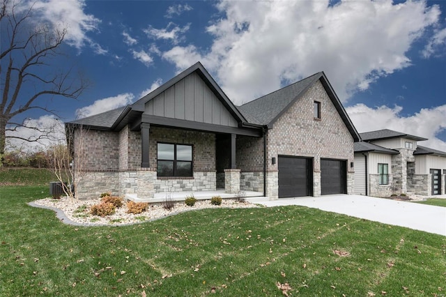 view of front of home featuring a garage and a front yard