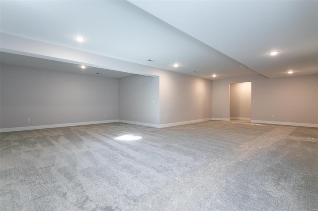 basement with light colored carpet